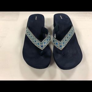 Embellished blue wedge sandals by Avenue